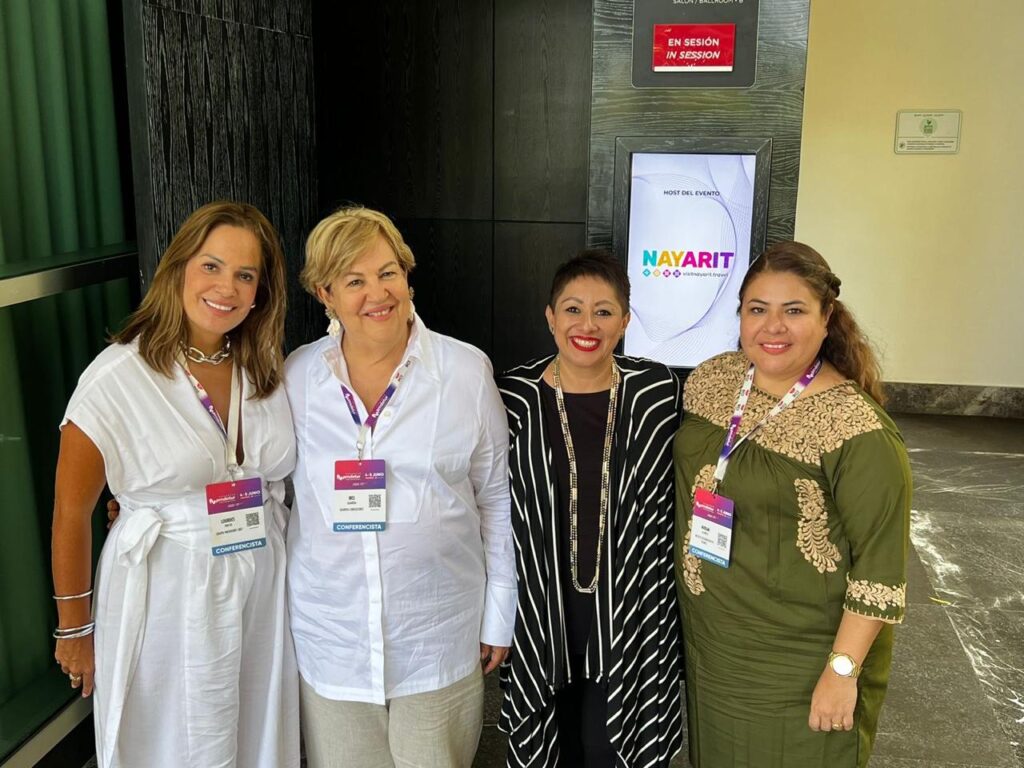 foto de ines guardia y ponentes en el congreso amdetur 2024 abordando la sustentabilidad en el turismo